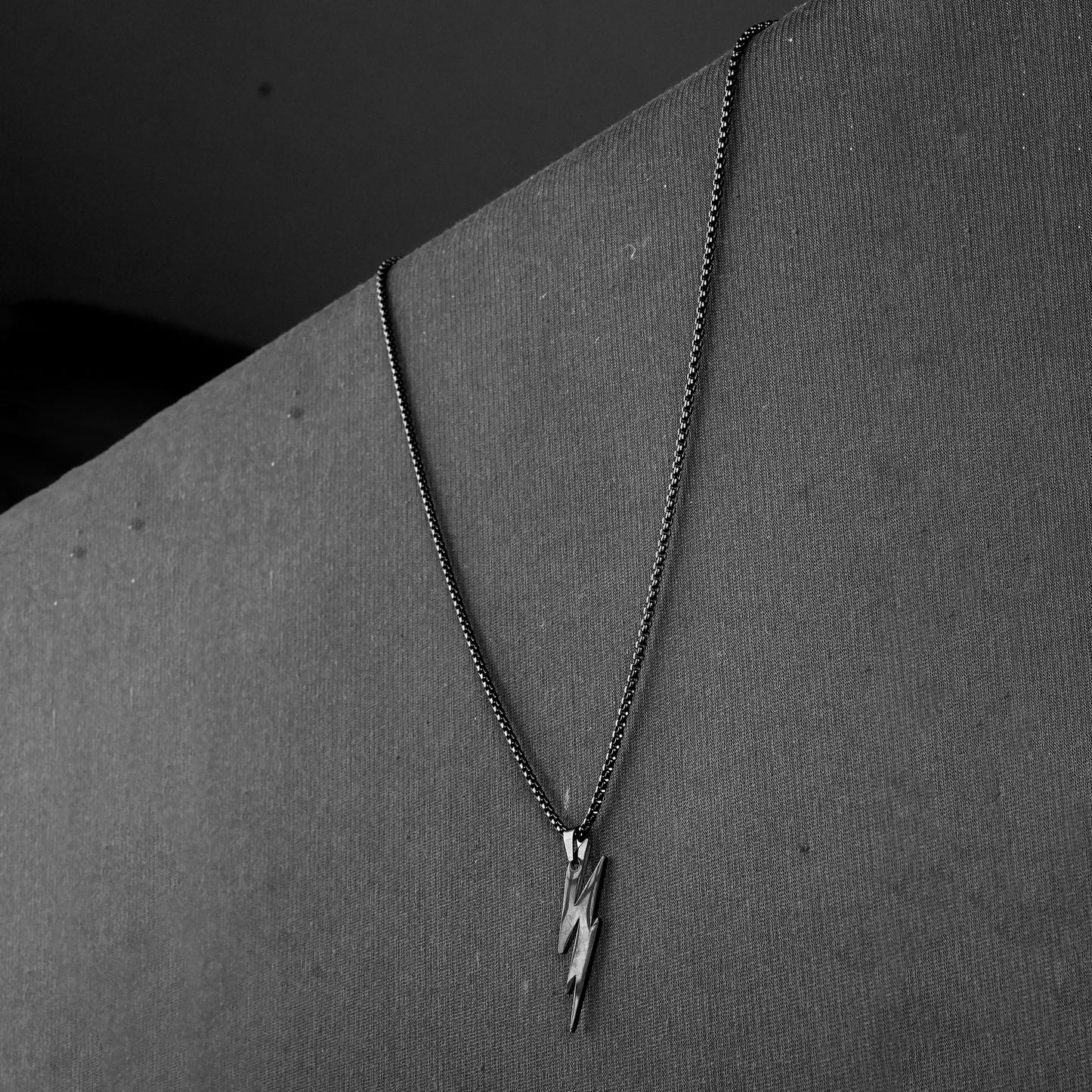 Lightning pendant with Black Roundcut chain -316L