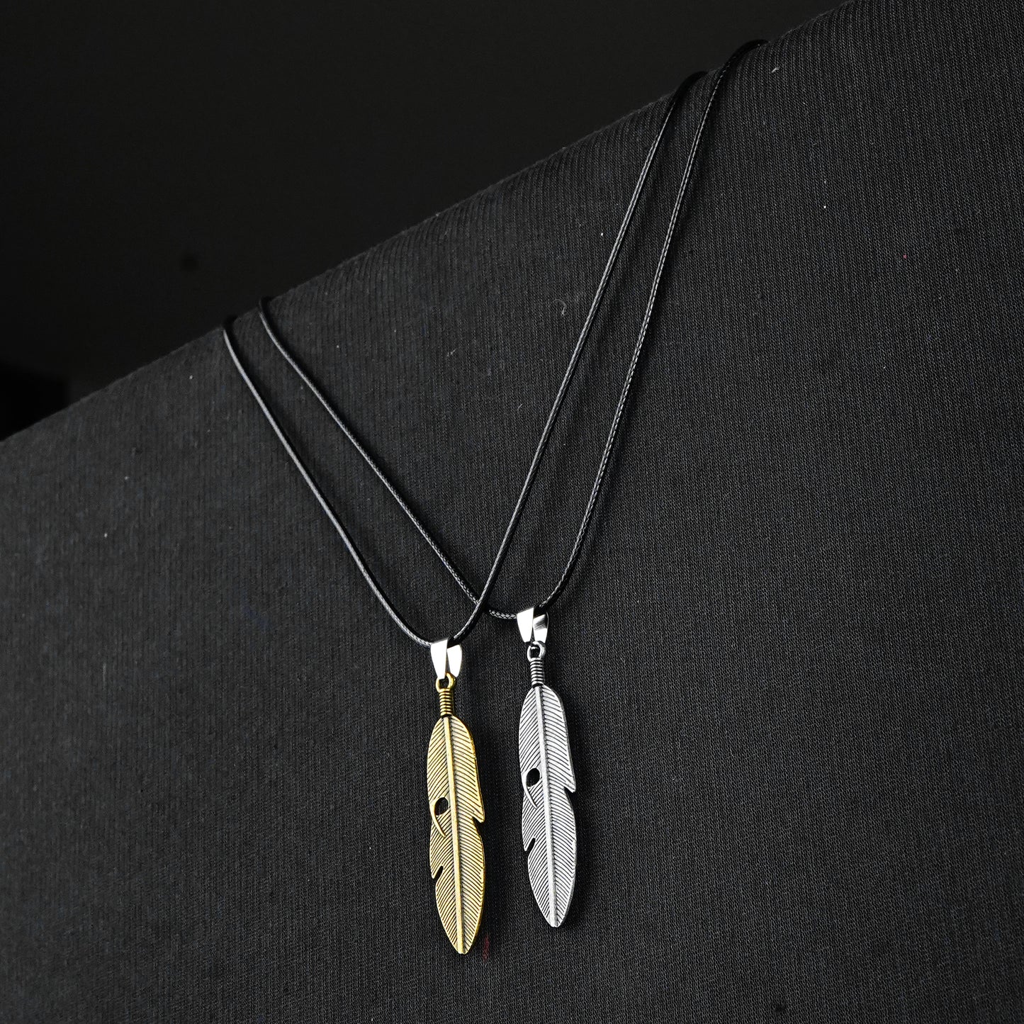 Pair of Golden & Silver Feather pendant with Black rope -316L