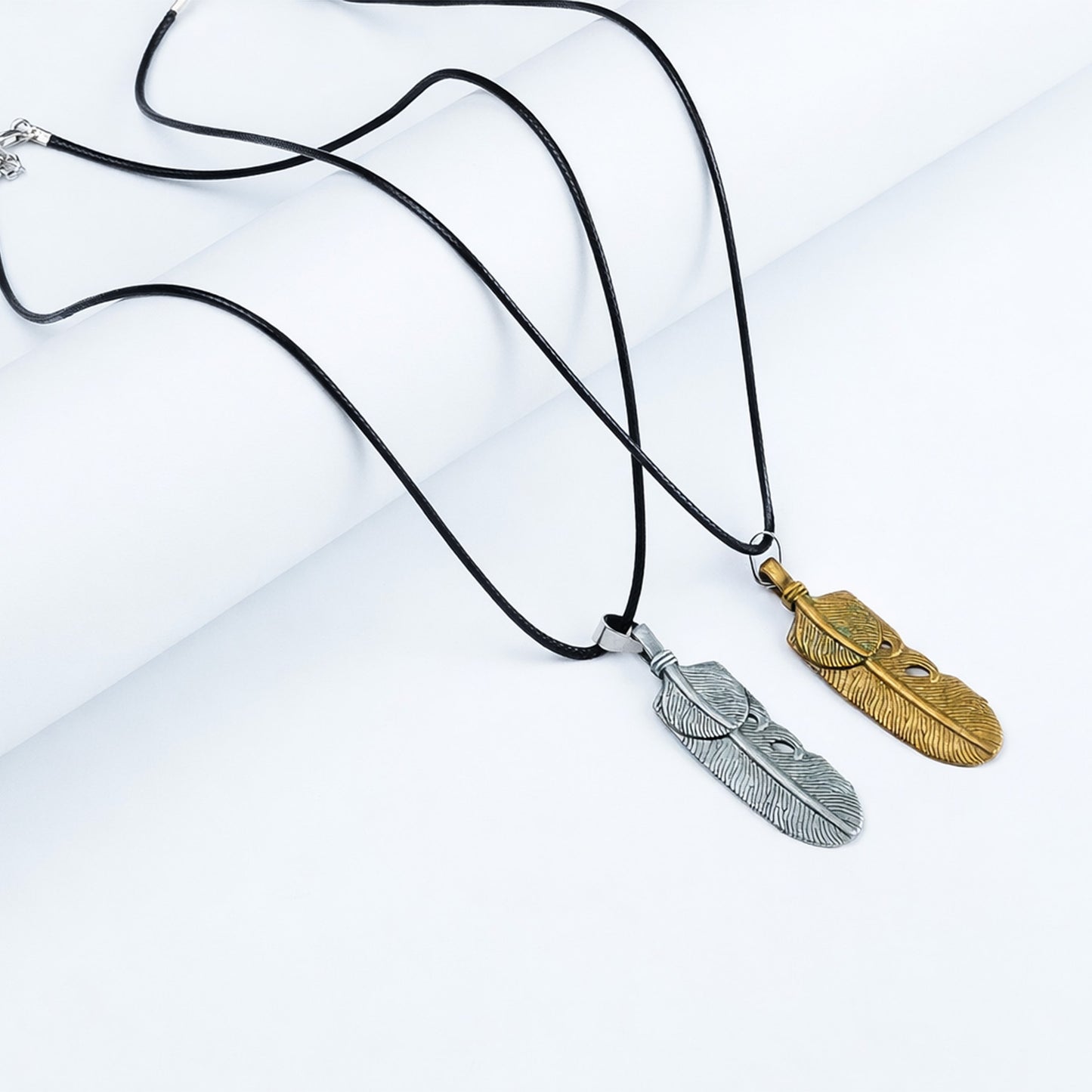 Pair of Flex Golden & Silver Feather pendant with Black rope -316L