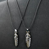 Pair of Golden Feather & Skull pendant with Black rope -316L