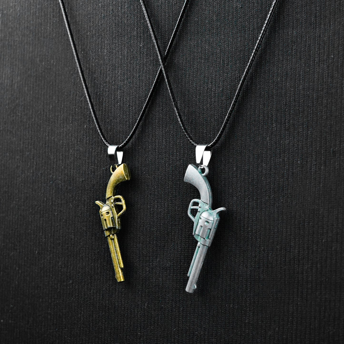 Pair of Golden, Silver revolver pendant with Black Rope -316L