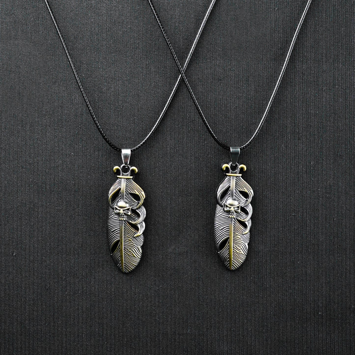 Pair of Golden Feather & Skull pendant with Black rope