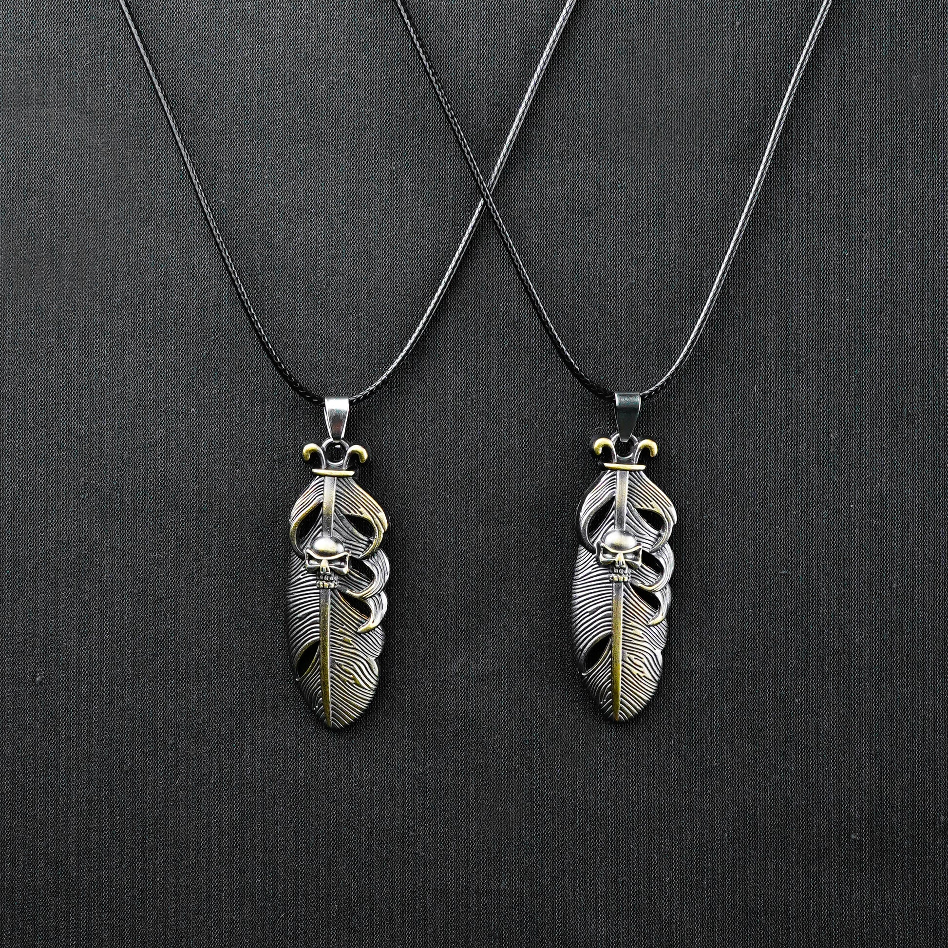 Pair of Golden Feather & Skull pendant with Black rope