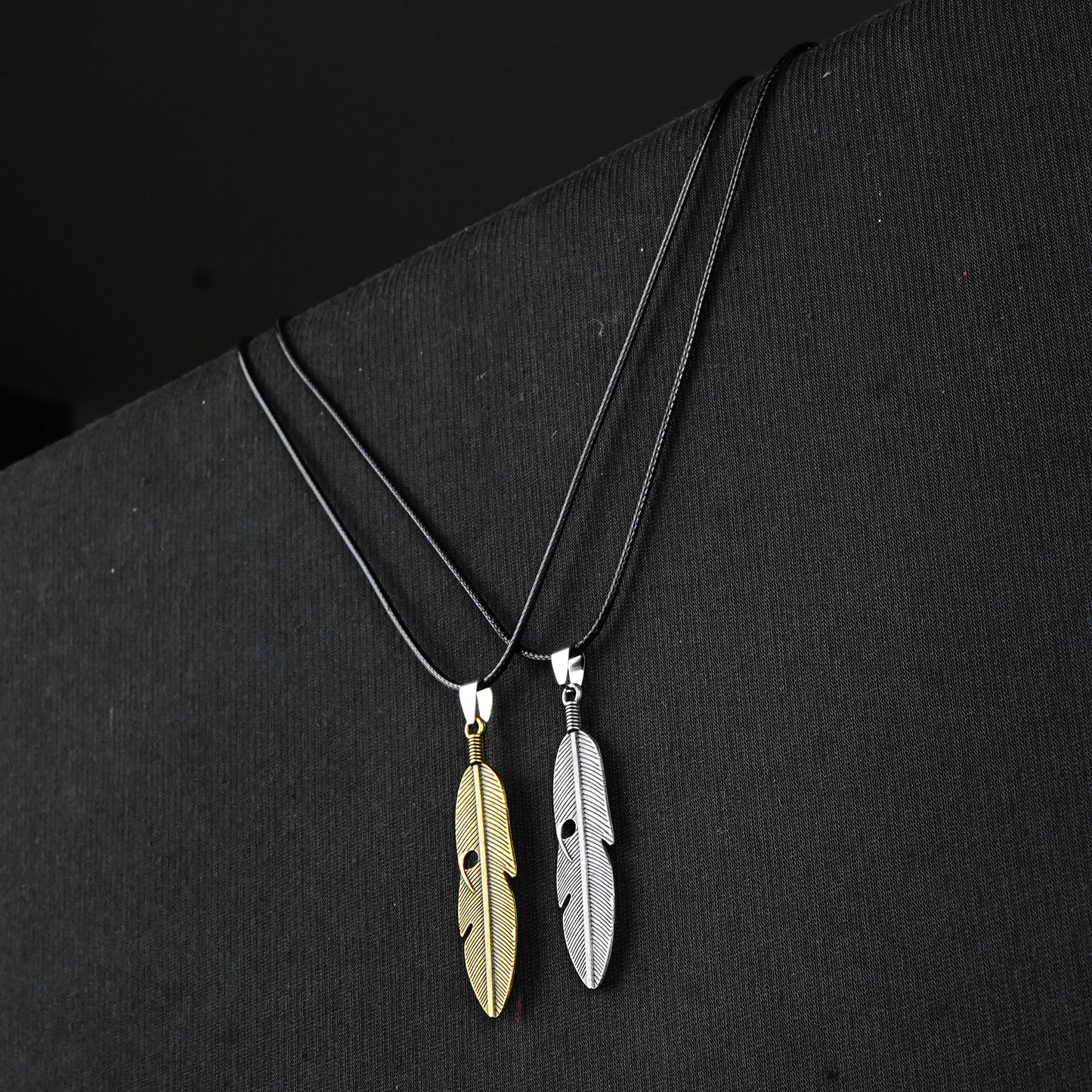 Pair of Golden & Silver Feather pendant with Black rope