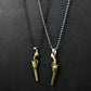 Pair of Golden revolver pendant 